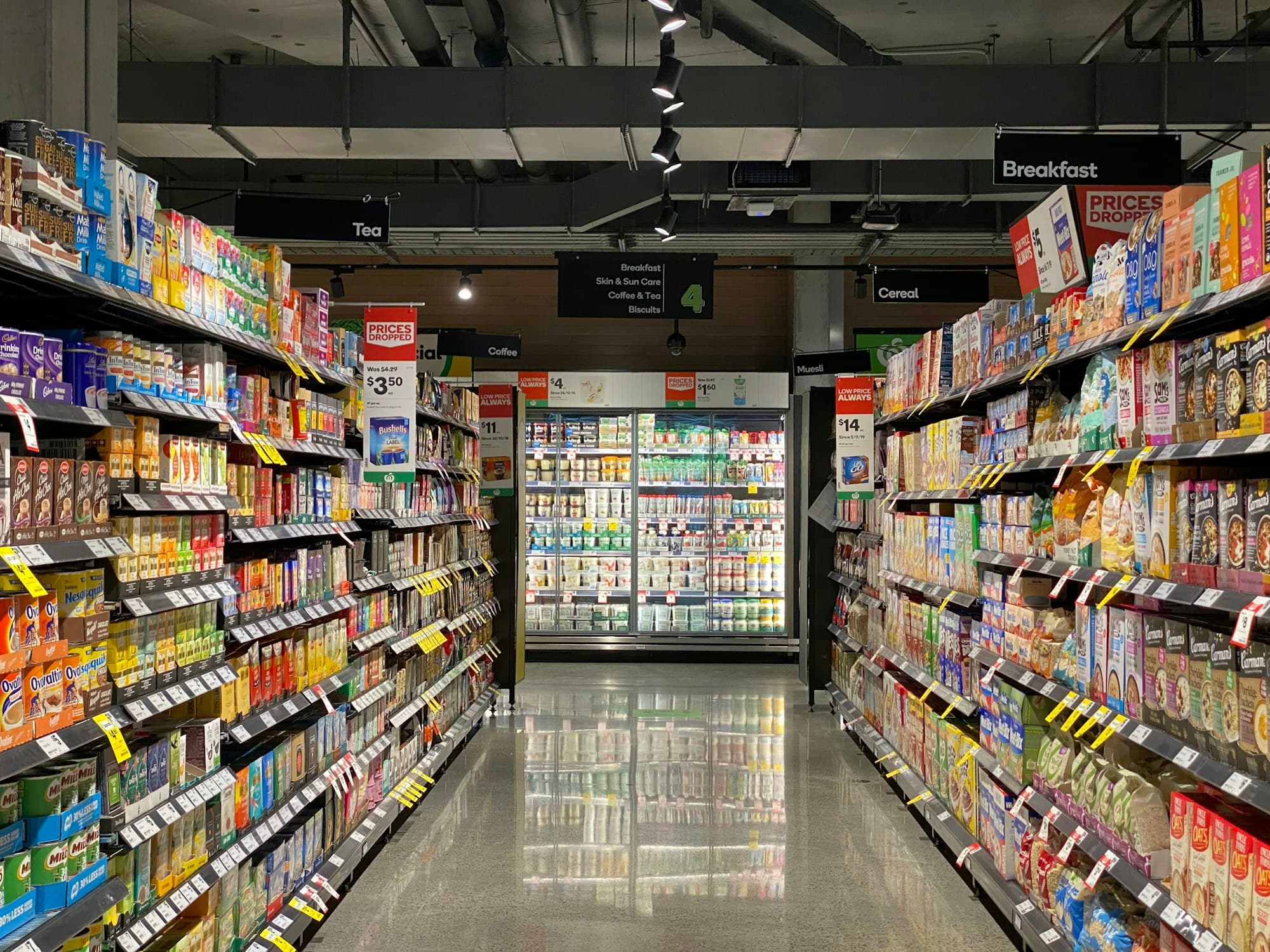 A fully stocked, organized grocery aisle — the result of Stocked's work.